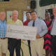 The check presentation at the McGiveney Center.