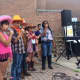Sporting their straw hats and plaid shirts, many students sang with microphones for the first time in front of an adoring audience. 