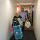 Familes and friends move students into Alumni Hall Thursday.
