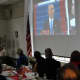 Residents watch as President Barack Obama delivers his inaugural address.