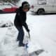 A Cortlandt resident shoveling snow Friday. 