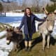 Bethany Zaro of New Canaan stands with her donkeys Chipper, left, and Poppy. Chipper has recovered after being attacked by a pair of dogs last month. 