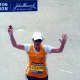 Michele Lawton of Ossining crosses the finish line at the Boston Marathon in 2010.