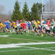 Youth runners start a relay at the 12th annual Jim Keller Middle School Track & Field Relay Championships at New Fairfield High School, in New Fairfield.