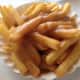 The fluffy, yet crispy, gravy-soaked fries at Rutt's Hut in Clifton go well with their famous "rippers," hot dogs deep fried until their casings split and crack.