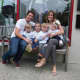 Owners Carolyn and Dave Frost with their four children at the new Balance Yoga & Wellness in Larchmont.