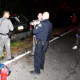 Police and fire officials search for any survivors of a single-car accident in Mahopac.