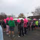 Runners drape themselves in pink for the Vicki Soto 5K in Stratford. 