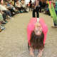 Some entertainers bent over backwards to bring smiles to the Adult Day Program guests.
