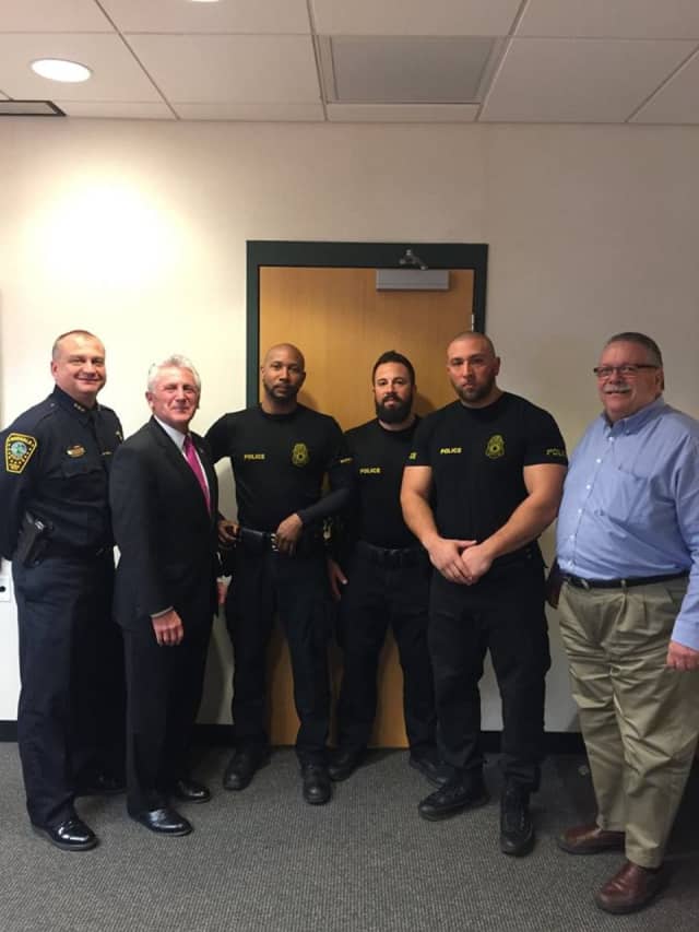 Three Norwalk police officers were recently honored as Officer of the Month for their work on drugs. L-R Chief Kulhawik, Mayor Rilling, Officer Lee, Officer Geismar, Officer Pugliese and Commissioner Yost.