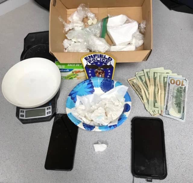 Police confiscated 830 grams of crack and powder cocaine as well as drug paraphernalia (all pictured here) when they served a search warrant at a Tariff Street home, July 14.