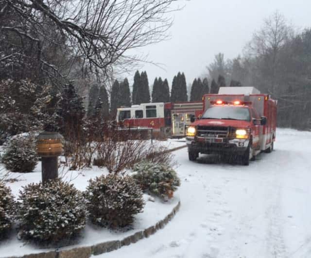 The Weston Volunteer Fire Department turns out on a snowy Monday afternoon.