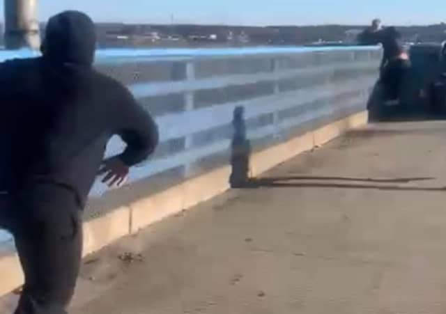 Dramatic video captures the heroics of NJ Correctional Officer Faustino Saucedo on the Route 1/9 bridge over the Raritan River.