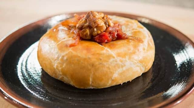 The Culinary Institute of America has a recipe for baked Camembert cheese with tomato chutney.