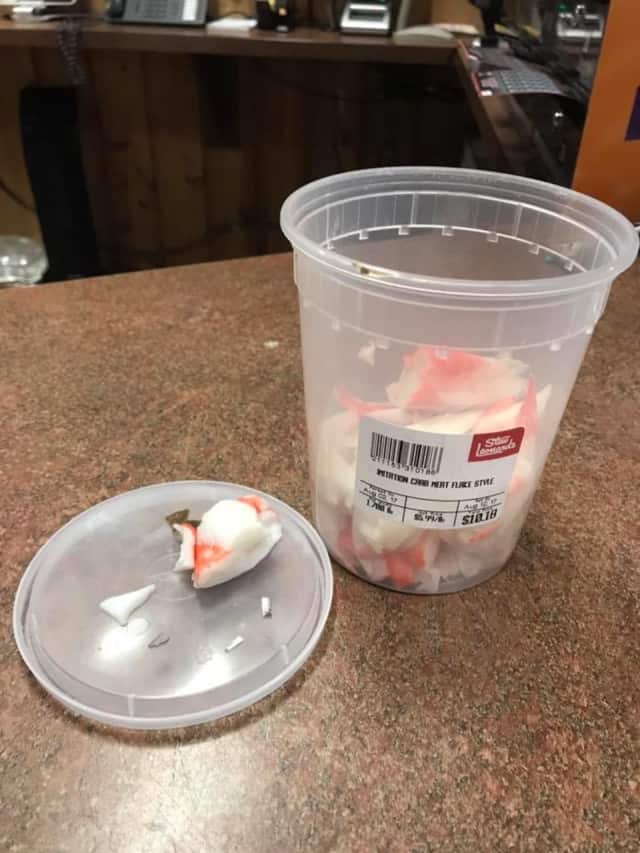 Two small shards of metal (on the lid, in the front) were found in imitation crab meat sold at Stew Leonard's.