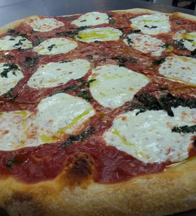 This margherita pizza from Duke's is considered top-notch in the area.