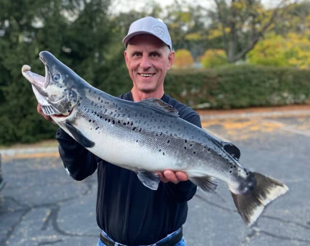 Joe Satkowski of Hampton set a new record for the largest landlocked salmon catch in the state, officials confirmed.