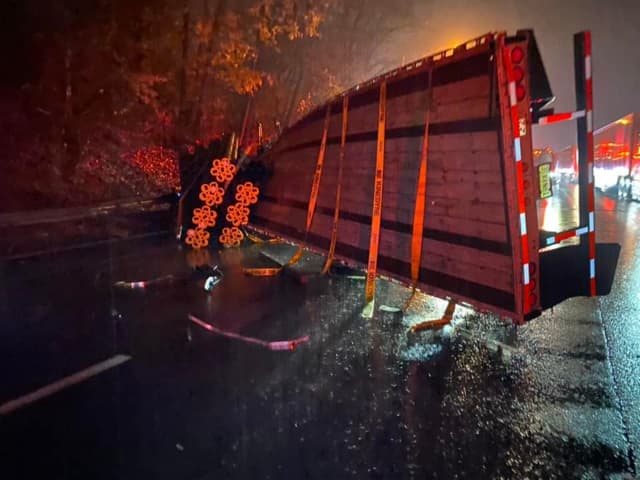 The tractor-trailer that rolled.