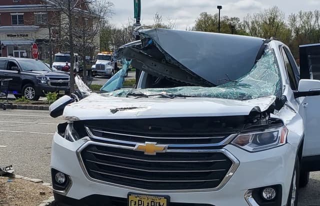 The out-of-control SUV barreled across the front of this Chevy Traverse in the Boulder Run Shopping Center in Wyckoff.