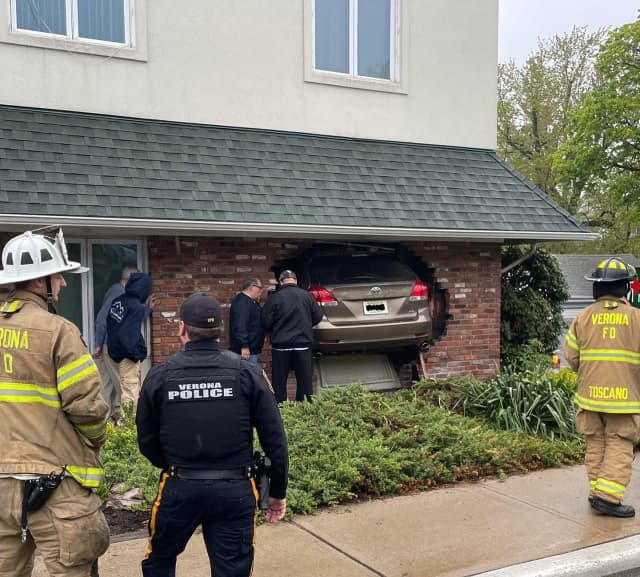 A car slammed through the side of a brick building early Wednesday, May 4 in Verona.