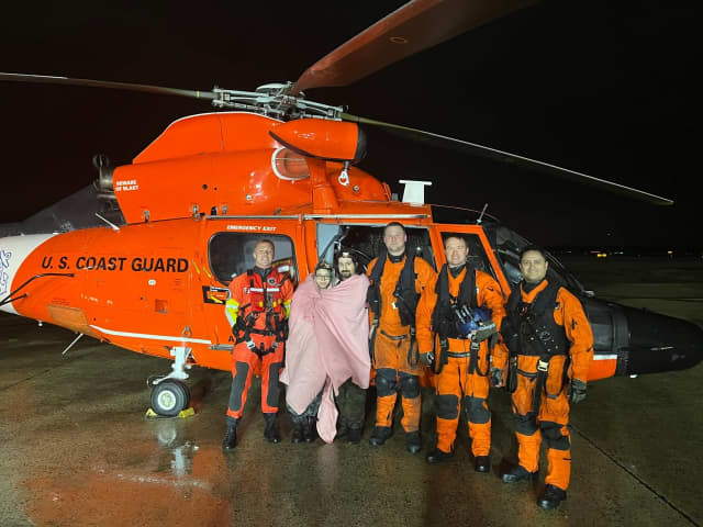 US Coast Guard rescuers and the mariners.