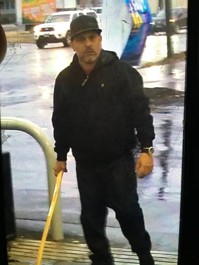 Police are trying to identify the man picture for attacking another person with an ax.