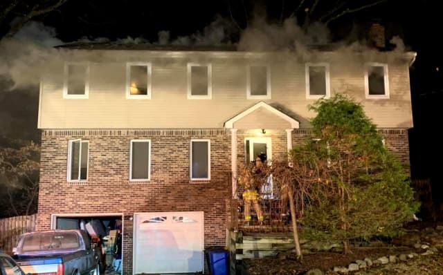 Hillsdale firefighters doused the overnight Thanksgiving Day blaze with help from their colleagues in neighboring towns.