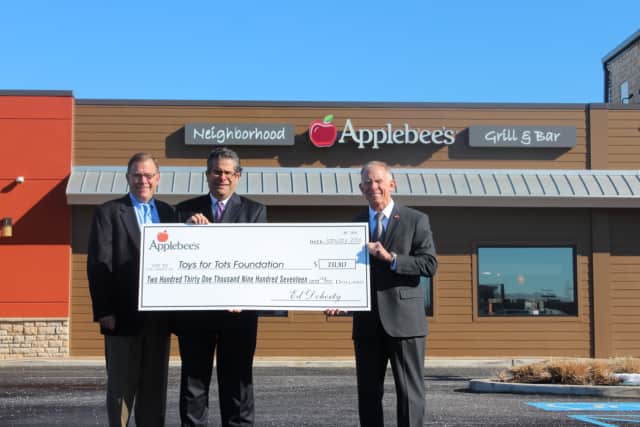 From left: Kevin Coughlin, Applebee's director of operations, David DiBartolo, vice president of operations, and Lt. General Pete Osman, president and chief executive officer for Toys for Tots