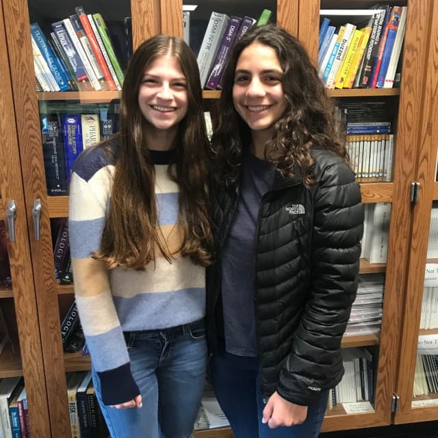 Byran High School seniors Rachel Chernoff and Samantha Abbruzzese, two of 12 finalists in a neuroscience research prize.