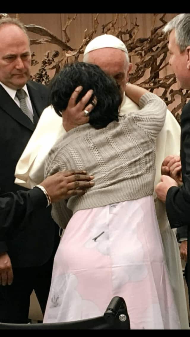 Bridgette Nathan hugs Pope Francis
