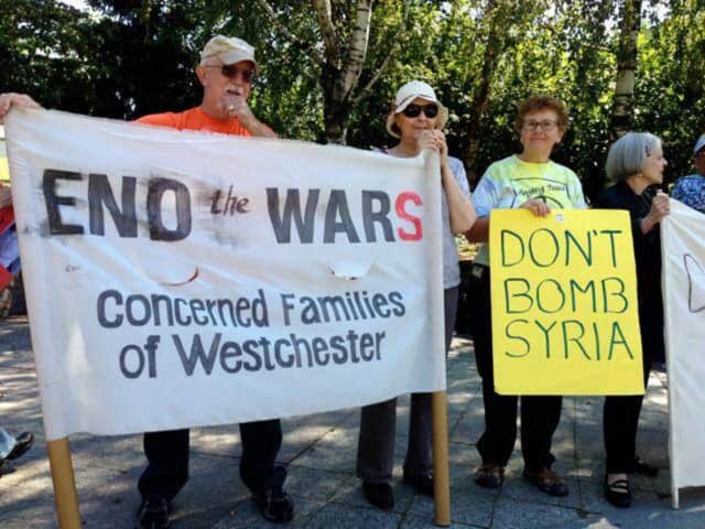 Members of Concerned Families of Westchester protest the bombing of Sytia in 2014. The group is planning to rally against current immigration and refugee policies this weekend in Hastings-on-Hudson.