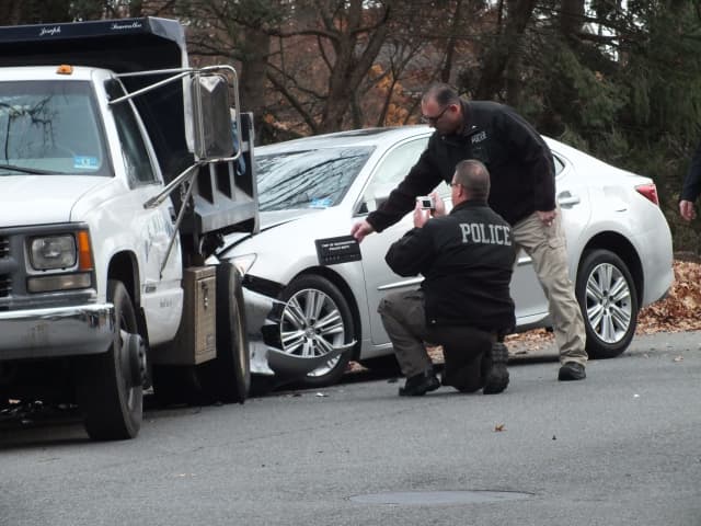 Washington Township detectives at the scene of the crash on Hampshire Road.
