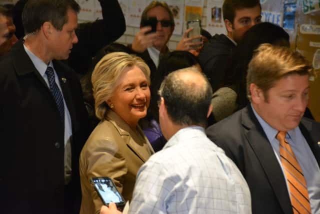 Hillary Clinton walks through the auditorium of Douglas G. Grafflin Elementary School in Chappaqua, where she cast her presidential vote in November 2016.