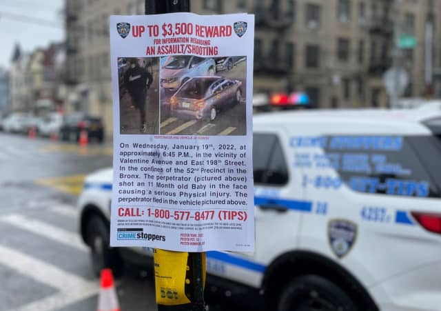 Reward posters taped up in shooting of 11-month-old baby in the Bronx.