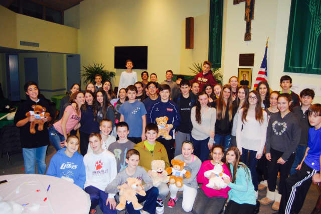 Heavenly Productions Foundation along with 43 eight-grade Confirmation students delivered 200 stuffed bears they made to sick children at Maria Fareri Hospital as part of their community service project.