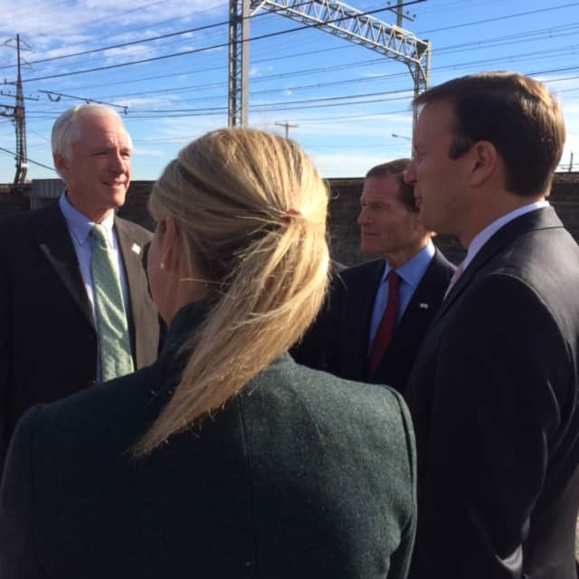 Bridgeport Mayor Bill Finch speaks with Federal Railroad Administrator Sarah Feinberg and U.S. Sens. Richard Blumenthal and Chris Murphy on what they hope will be the future site of Bridgeport's second train station. 