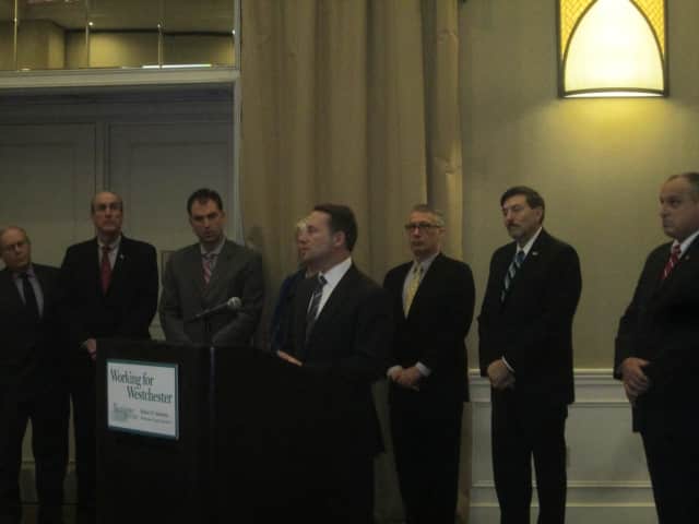 County Executive Rob Astorino is flanked by county and local officials at a press conference where he denounced Gov. Andrew Cuomo for Indian Point's closure.