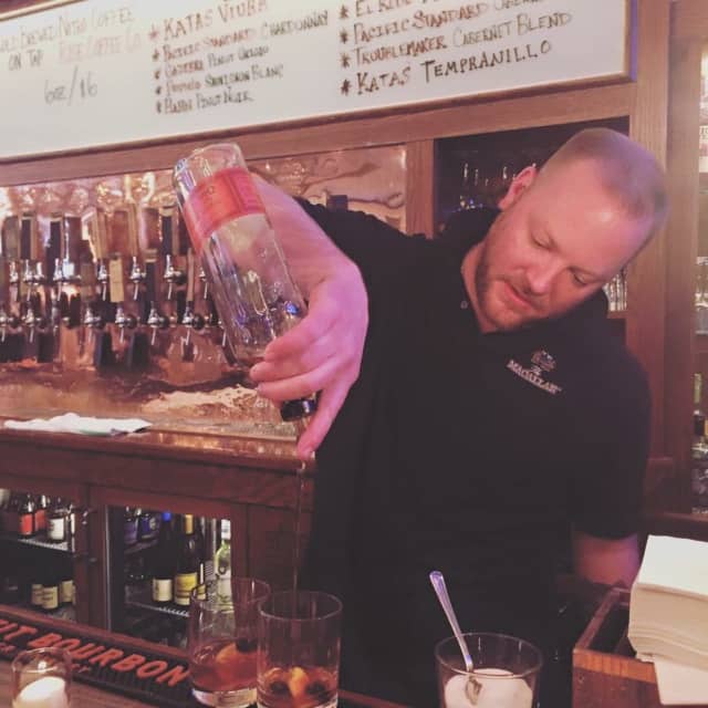 Pouring cocktails at Cask Republic in Norwalk. The  restaurant is known for its extensive beer selection.