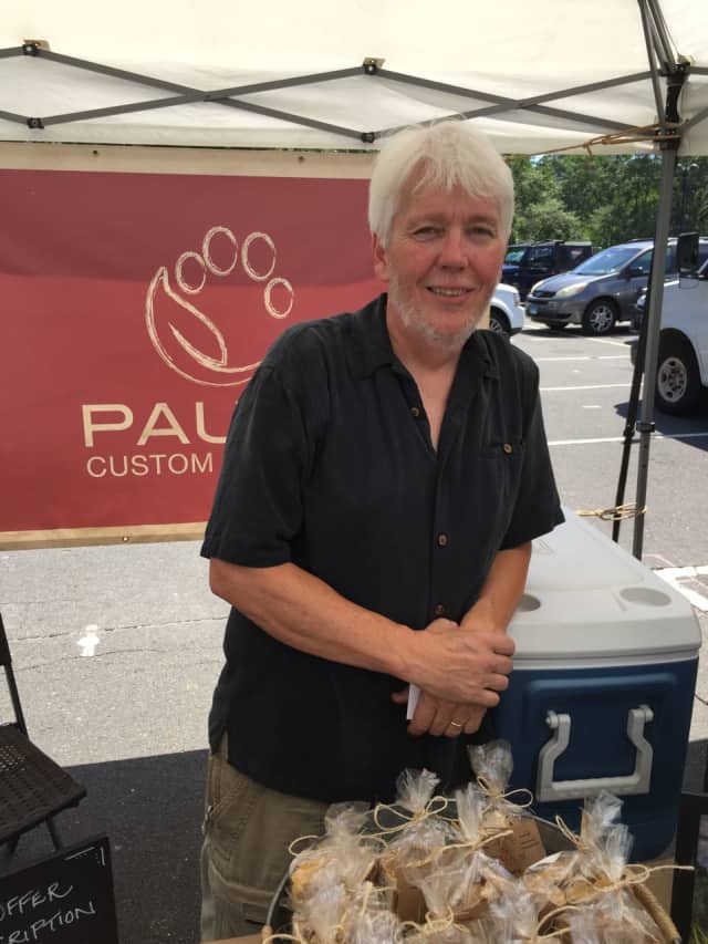 Paul Gallant stands in front of his Paul's Custom Pet Food at the Westport Farmers Market last Thursday afternoon.