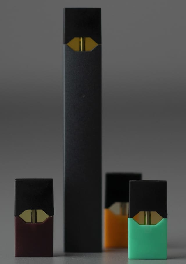 A Juul e-cigarette and pods