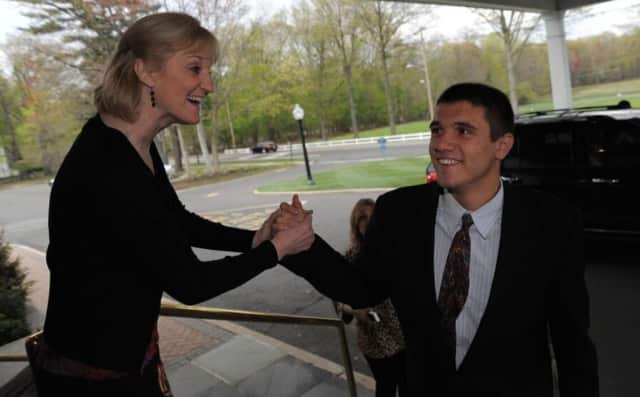 Kathy Vuoncino, the director of Region III special education, welcomes Thomas Dunn to last year's Valley Program Prom.