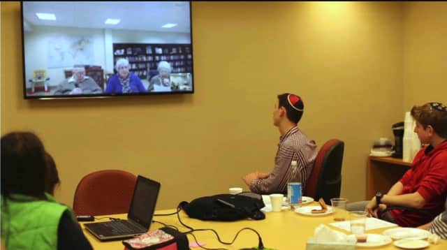 Students at the Frisch School in Paramus chat by Skype with George Hantgan, Marilyn Wechter, and Lillian Marion, residents of the Jewish Home at Rockleigh.