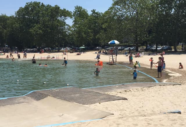 More than 100 people were on the beach or in the water on Friday, Memorial Pool Director Scott Homa said
