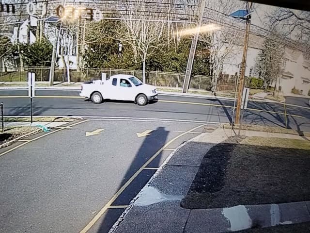 Metuchen police released this photo of a white pickup truck suspected in a hit-and-run crash.