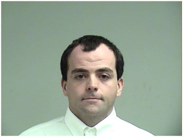 Michael Collins of Westport was arrested on Monday, Dec. 28 and charged with possession of child pornography, voyeurism and eavesdropping.