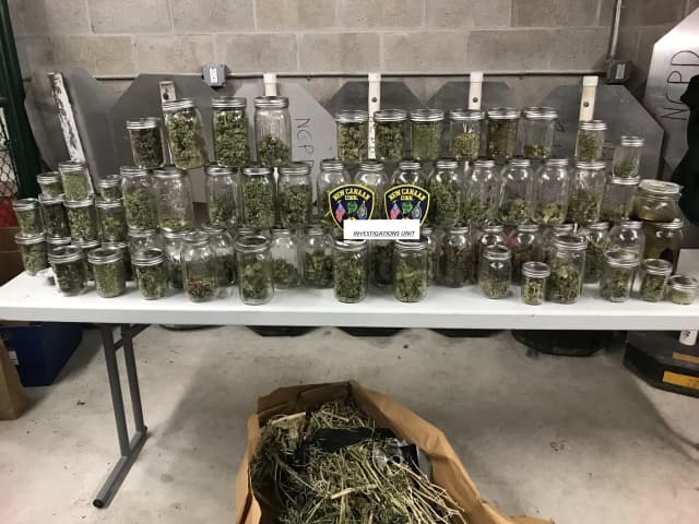 The grow operation, which occupied two rooms at the home, included irrigation systems, heat lamps, ventilation duct and multiple marijuana plants being cultivated, said police.
