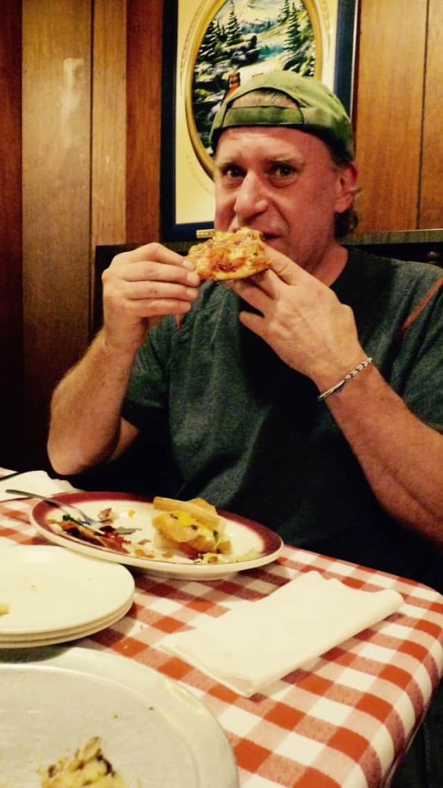 James Romaglio of Fair Lawn enjoying a bar pie at Kinchley's Tavern in Ramsey. 