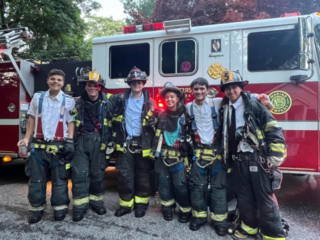 The Port Jefferson Fire Department reported that six local high school graduates responded to a fire right after receiving their diplomas.