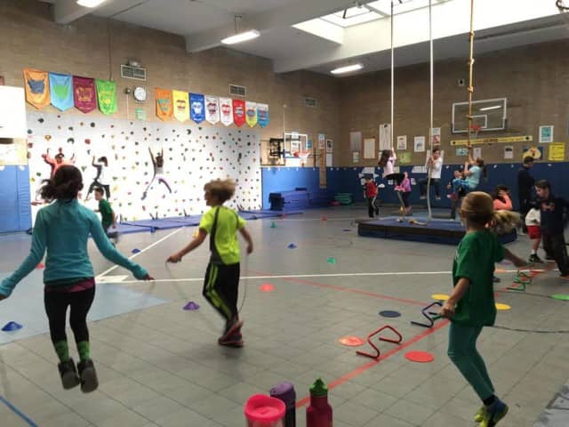 Fourth-grade students at Prospect Hill Elementary get some morning exercise.