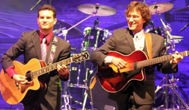 The Westport Library will host internationally acclaimed acoustic guitarists Frank Vignola and Vinny Raniolo on Sept. 20.